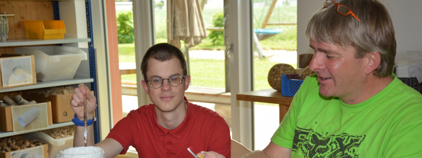 Two Men working at Diakoniewerk